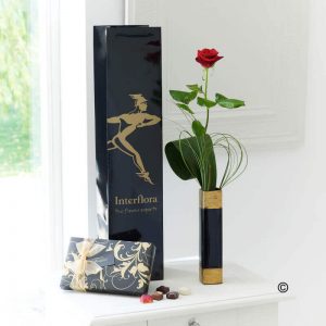 Single Red Rose and Chocolates