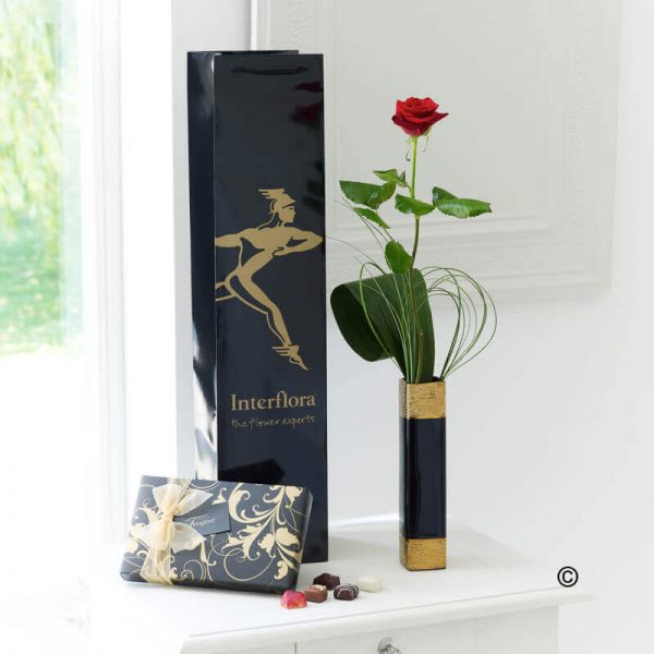 Single Red Rose and Chocolates
