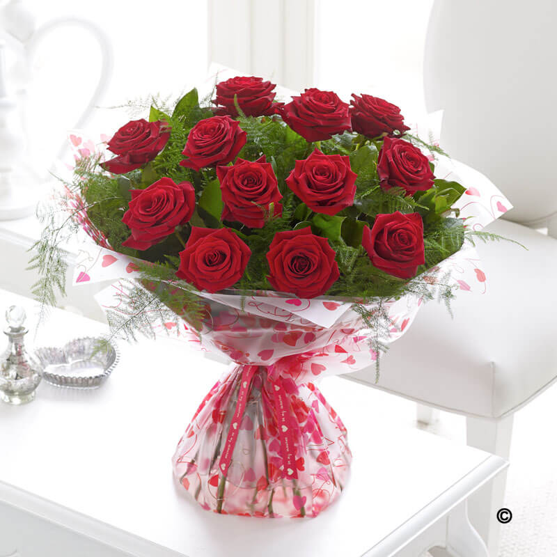 12 long stem red roses