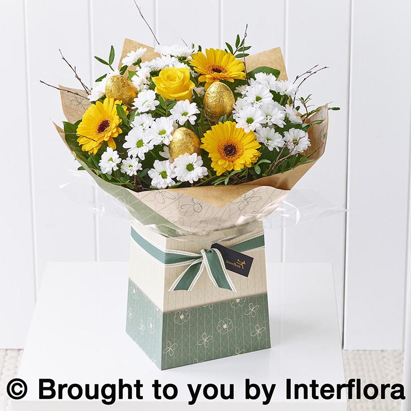 gift box of flowers including easter eggs