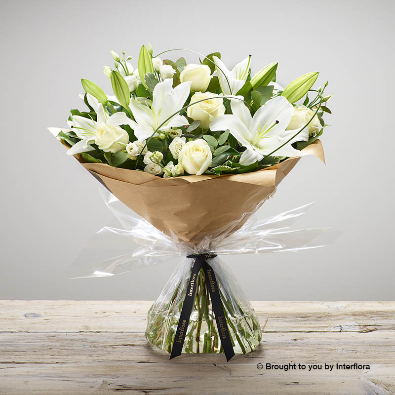 white lilies,lisianthus and roses
