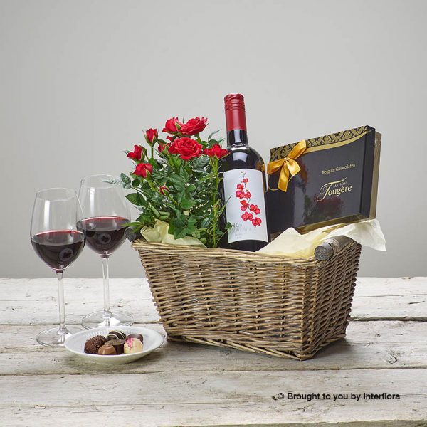 gift basket with wine,chocolates and plant